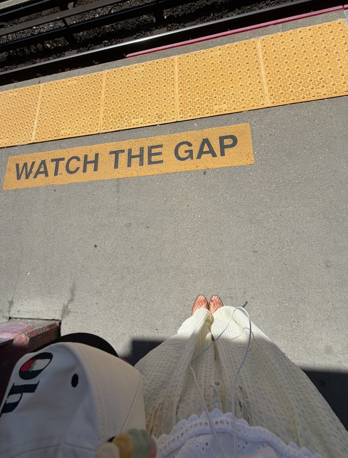 Watch the gap message at a train platform